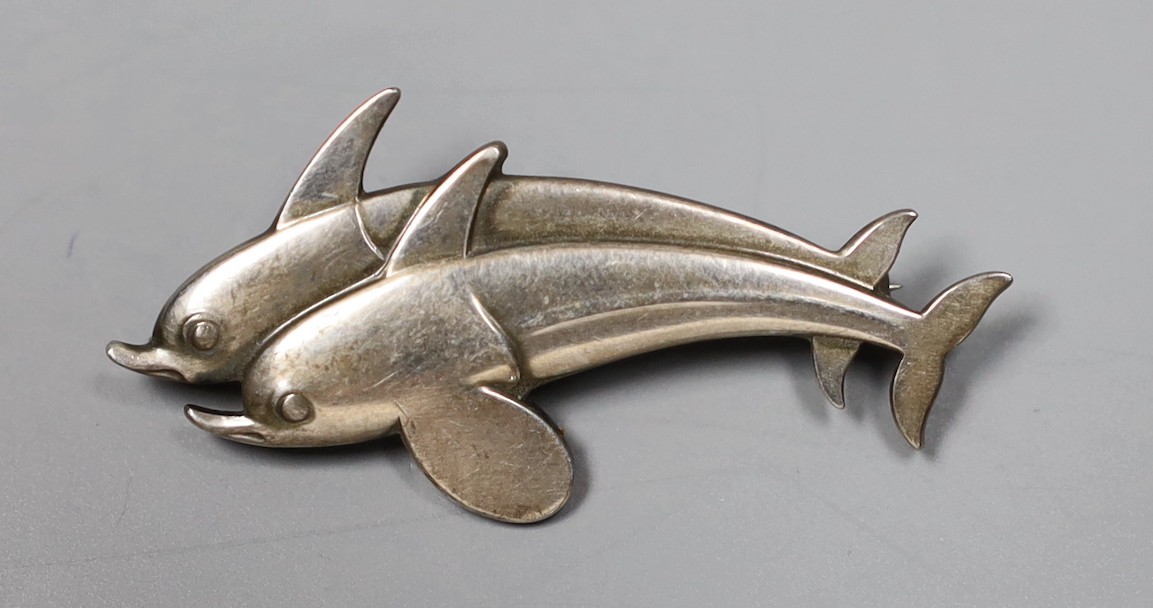 A Georg Jensen sterling twin dolphin brooch, no. 317, 40mm.